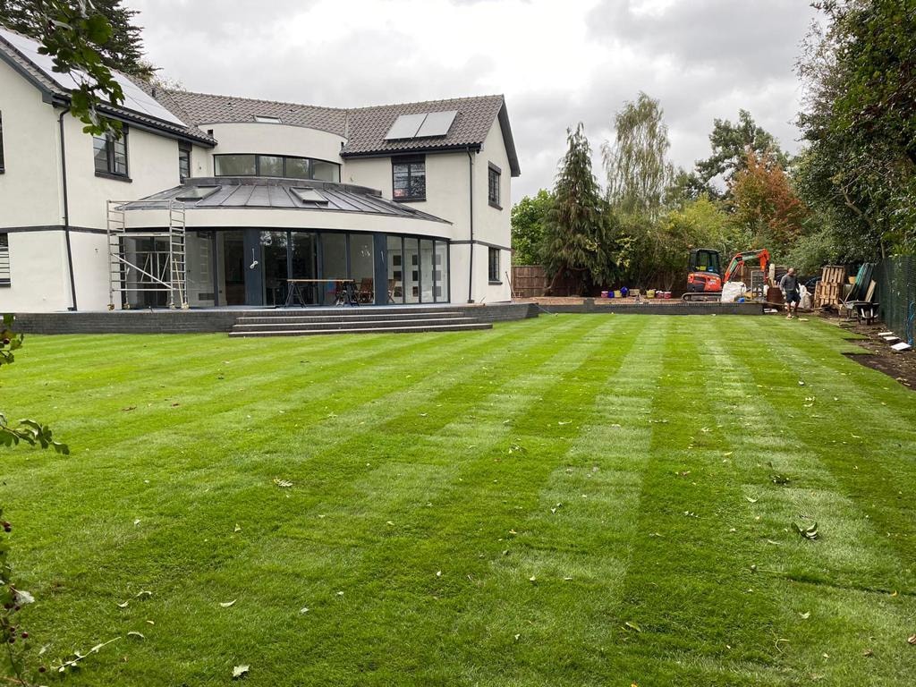 Freshly laid lawn in a landscaped garden