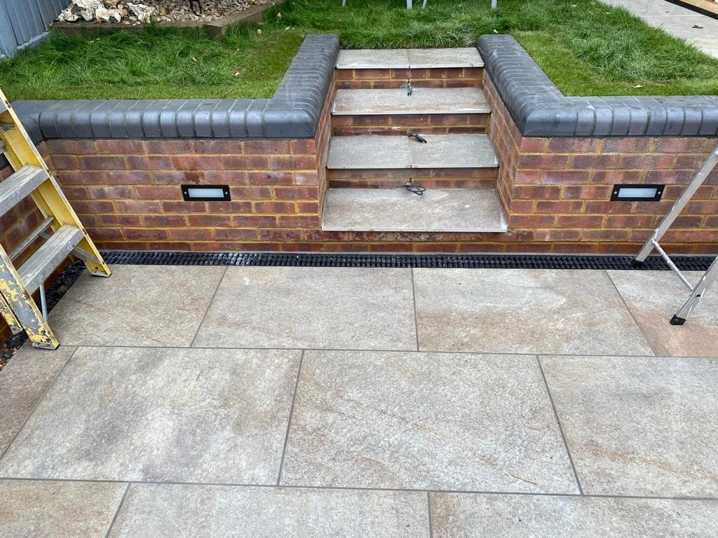 Brick garden steps with paved patio